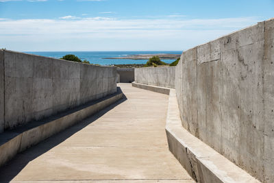 Pier over sea against sky