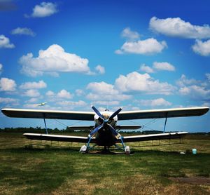 Airplane flying over blue sky