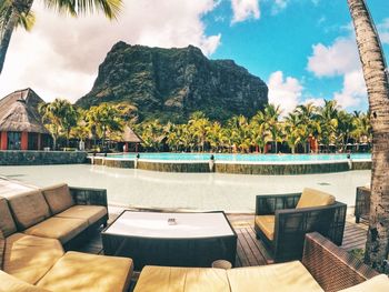 View of swimming pool against cloudy sky