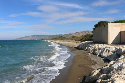 Scenic view of beach against sky