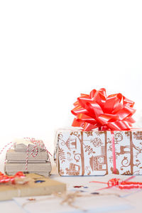 Close-up of christmas decorations over white background