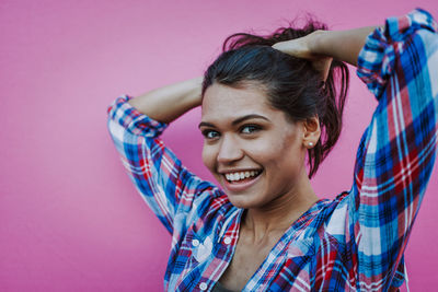 Portrait of smiling young woman