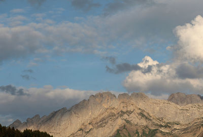 Low angle view of panoramic shot of mountains against sky