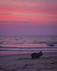 Scenic view of sea against sky at sunset