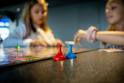 Close-up of people on table