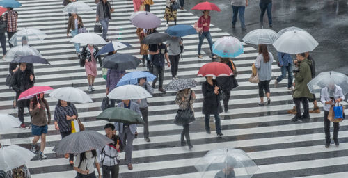 High angle view of people walking on street