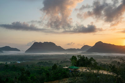 Scenic view of landscape against sky during sunset