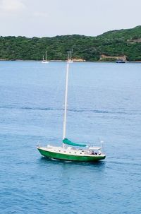 Boat in sea against sky