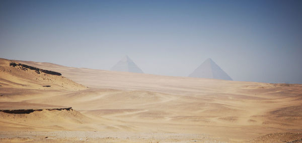 View of desert against clear sky