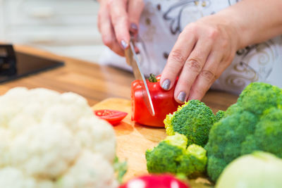 Midsection of man preparing food