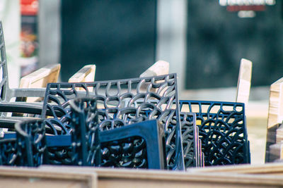 Close-up of empty chairs on table