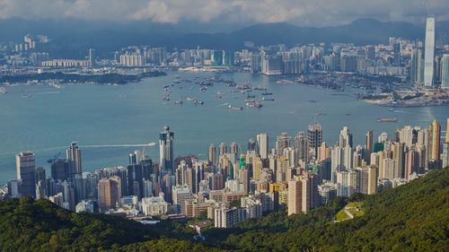 High angle view of cityscape by sea