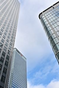 Low angle view of skyscrapers against sky