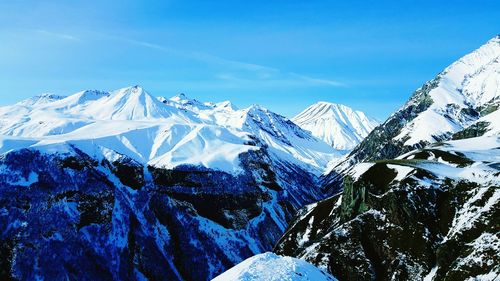 Scenic view of snowcapped mountains