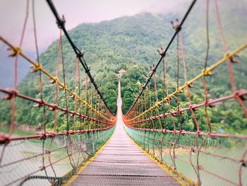 View of footbridge on mountain