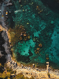 Close-up of rusty metal on rock