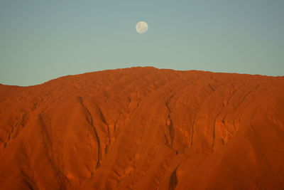 Scenic view of desert against clear sky