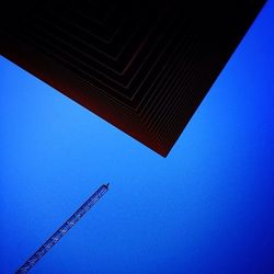 Low angle view of built structure against blue sky