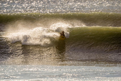 Man surfing in sea