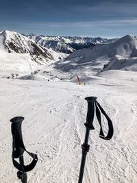 Shadow of people skiing on snowcapped mountain