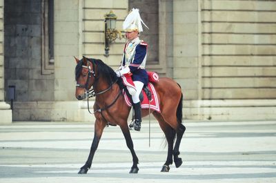 Man riding horse