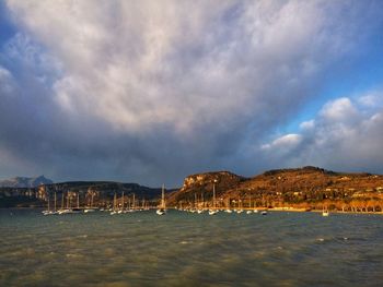 Scenic view of sea against cloudy sky