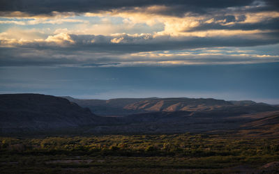 Scenic view of landscape against sky during sunset