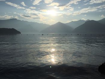 Scenic view of lake against sky during sunset