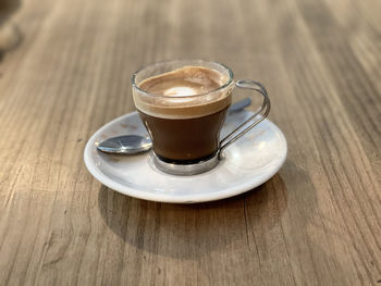 Close-up of coffee cup on table