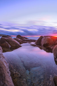 Scenic view of sea against sky during sunset