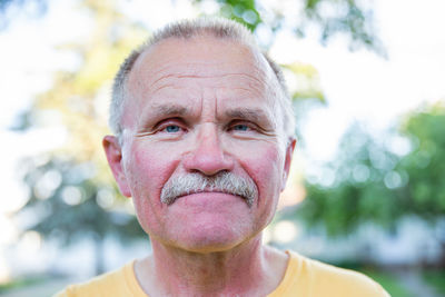 Close-up portrait of man outdoors