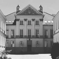 Facade of historic building against sky