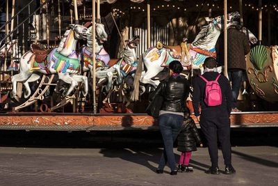 Full length of people standing in market