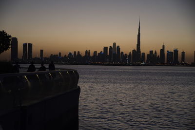 Dubai skyline from dubai creek harbour and dubai canal to downtown and business bay, uae