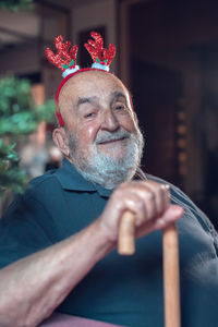 Low angle view of senior man with eyes closed
