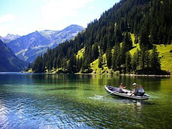 Boats in calm lake