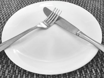 Close-up of empty plate on table