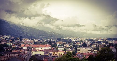 Aerial view of town against sky