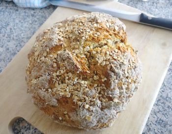 High angle view of bread on cutting board