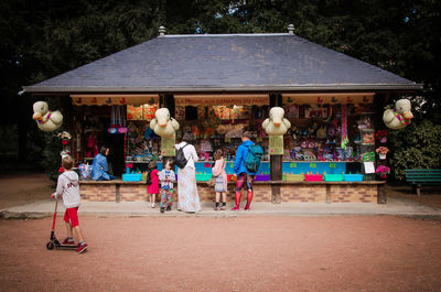 People at market stall