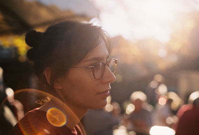 Close-up of thoughtful woman outdoors