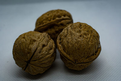 Close-up of fruits against white background