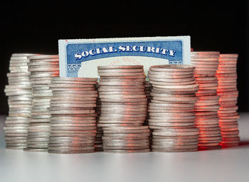 Close-up of coins on black background