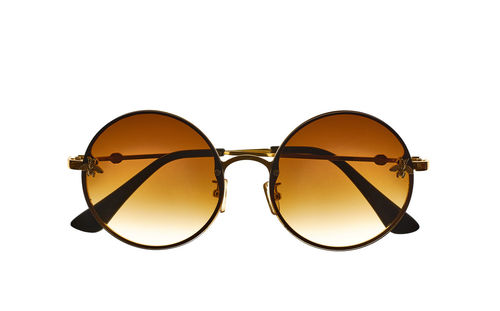 Close-up of sunglasses against white background