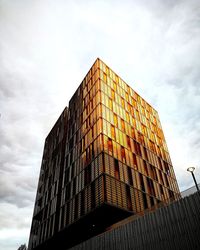 Low angle view of modern building against sky