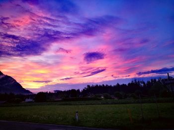 Scenic view of silhouette landscape against sky during sunset