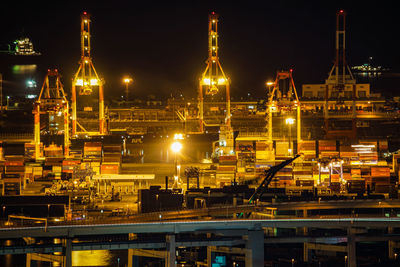 Illuminated buildings in city at night