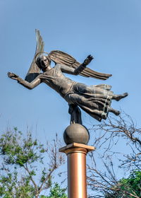 Low angle view of statue against clear sky