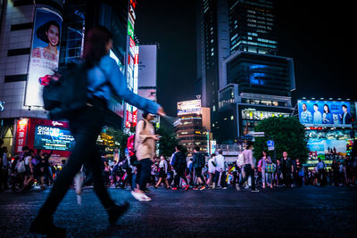 People walking on city street