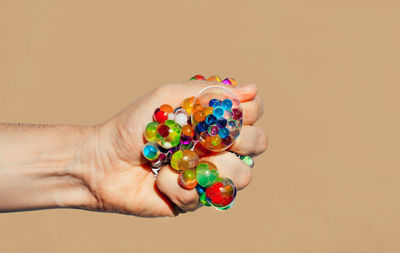 Hand holding stress toy